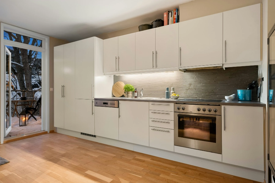 minimalist kitchen with white cabinets