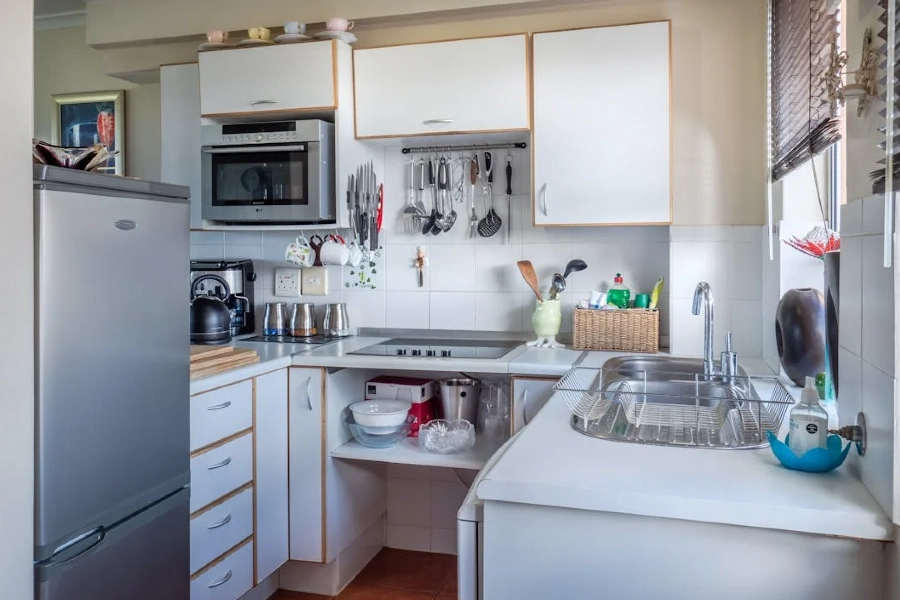 cozy kitchen with framed cabinets